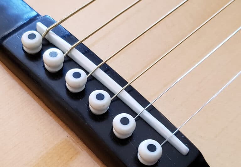 Tight Fitting Saddle on an Acoustic Guitar