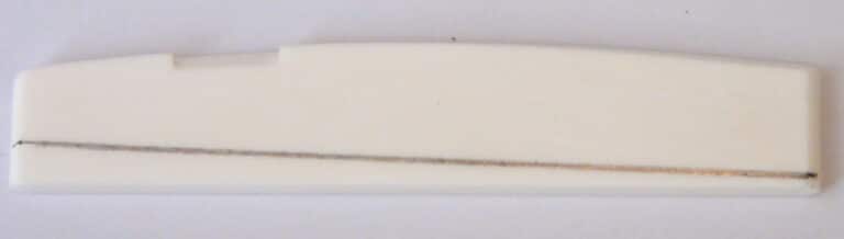 Pencil Line Showing Material to Remove on Bone Guitar Saddle