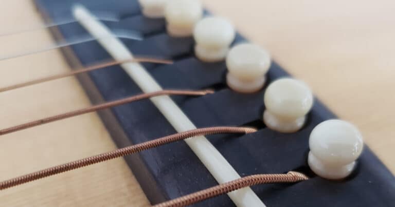 String Ramps on Acoustic Guitar Saddle