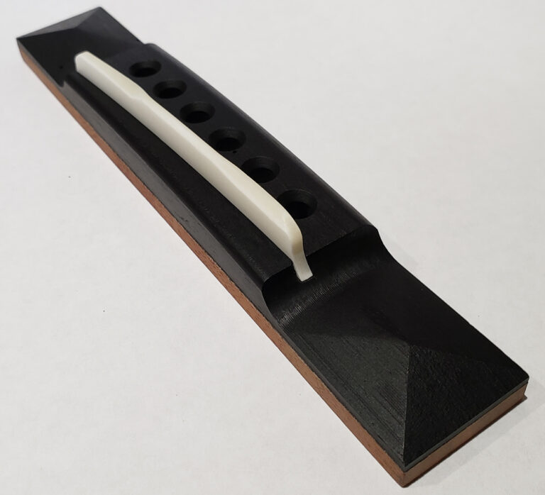 Bone cut through saddle on a Martin pyramid bridge.